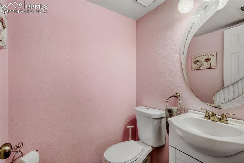 Image 15 of 17: Half Bath on Lower Level