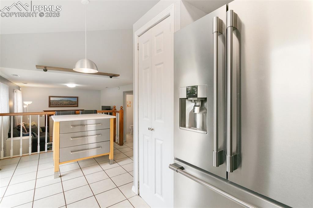 Image 13 of 36: Additional breakfast nook with walk out slider to the backyard.
