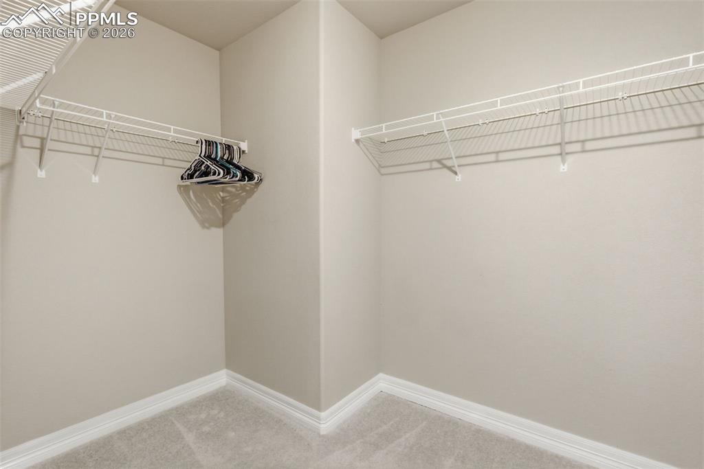 Image 33 of 50: Walk In Closet