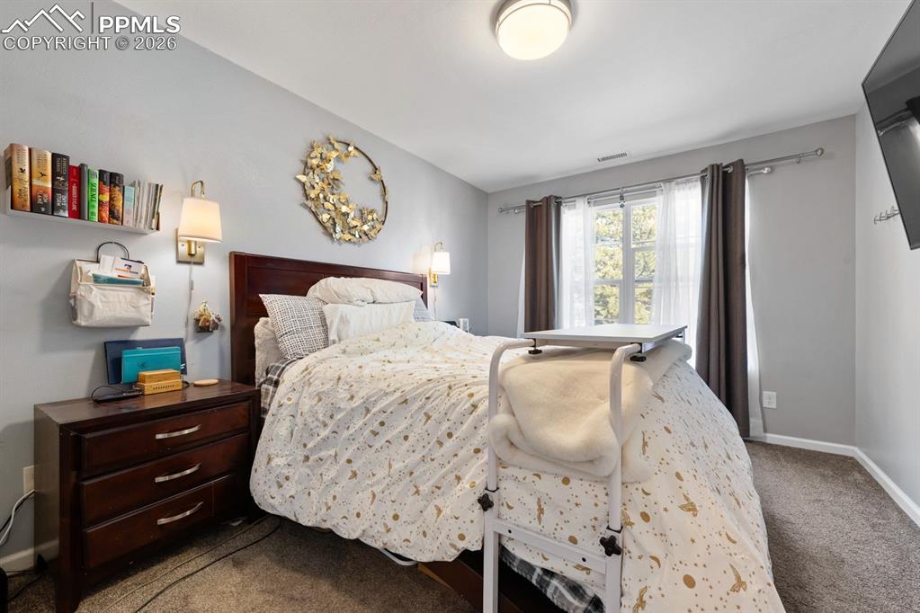 Image 12 of 39: Bedroom