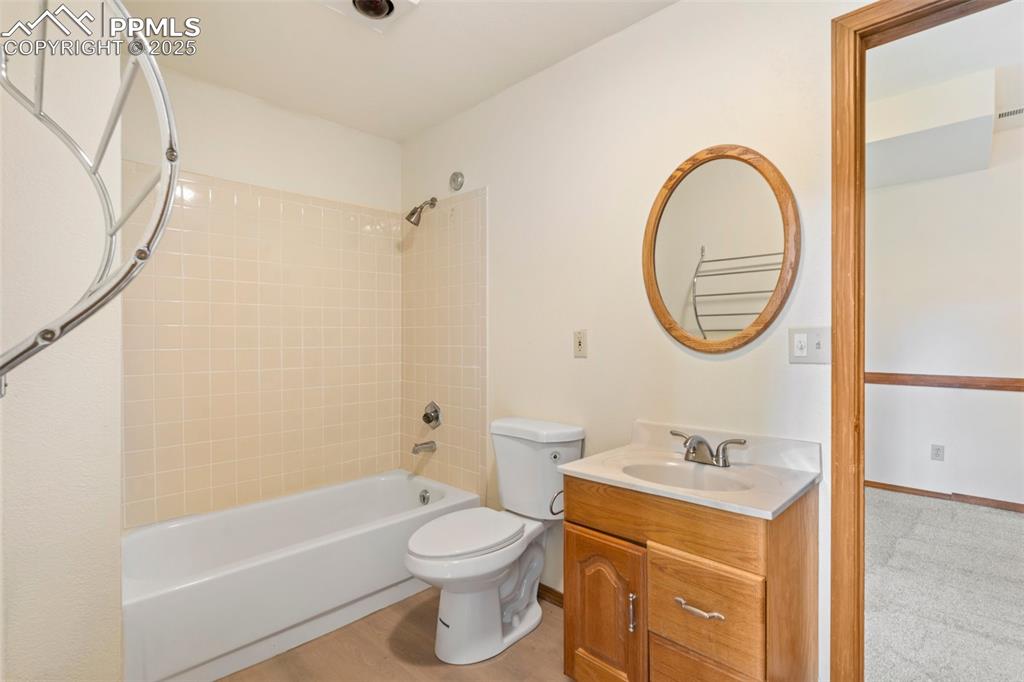Image 22 of 26: Full bath featuring bathtub / shower combination and vanity
