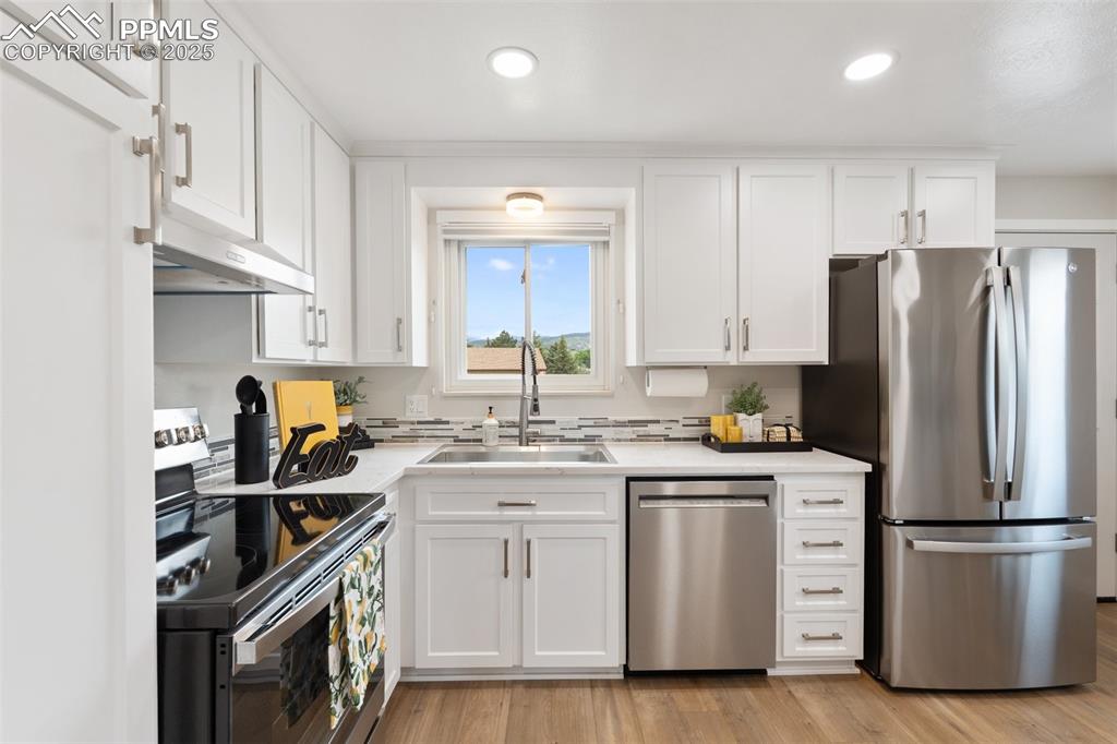 Image 5 of 50: Stunning remodeled kitchen