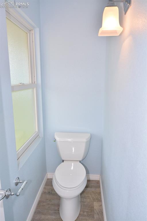 Image 25 of 50: Master Bathroom private toilet area