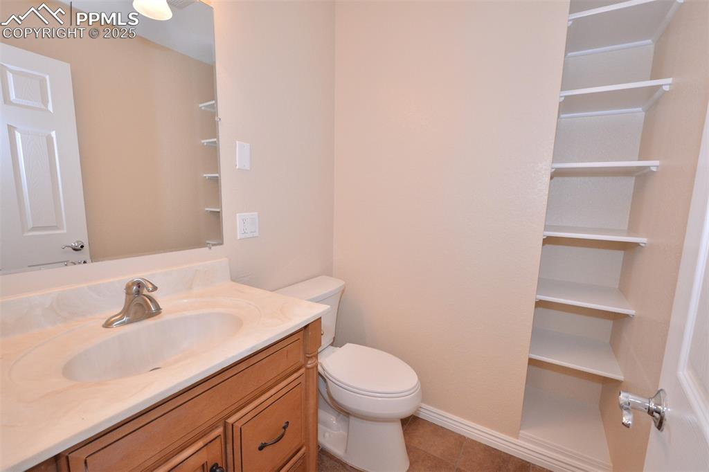 Image 26 of 50: Upper level half bathroom