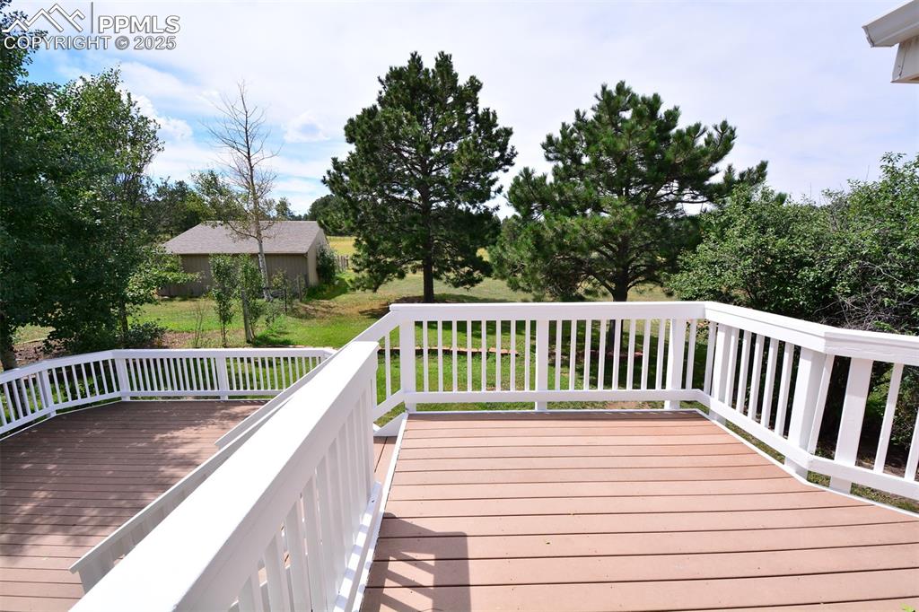 Image 32 of 50: Plenty of deck room to have a BBQ to enjoy with family and friends