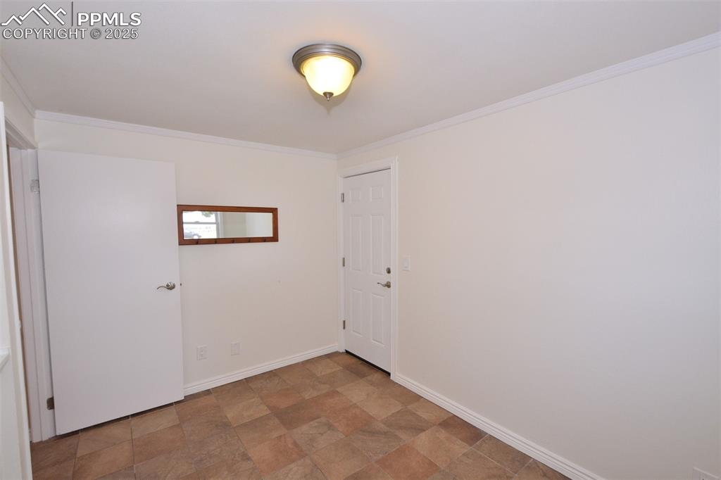Image 41 of 50: Mudroom with garage door entrance