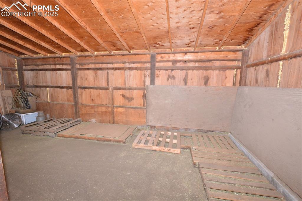 Image 47 of 50: Barn has plenty off storage for hay or to expand to add a couple more stall