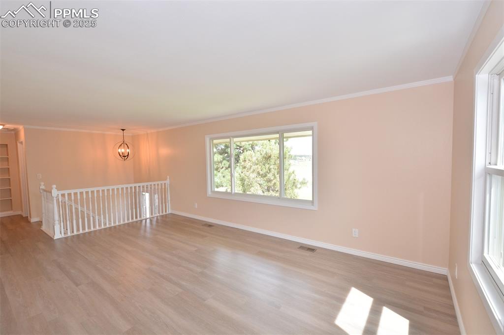 Image 8 of 50: Living room has plenty of natural light