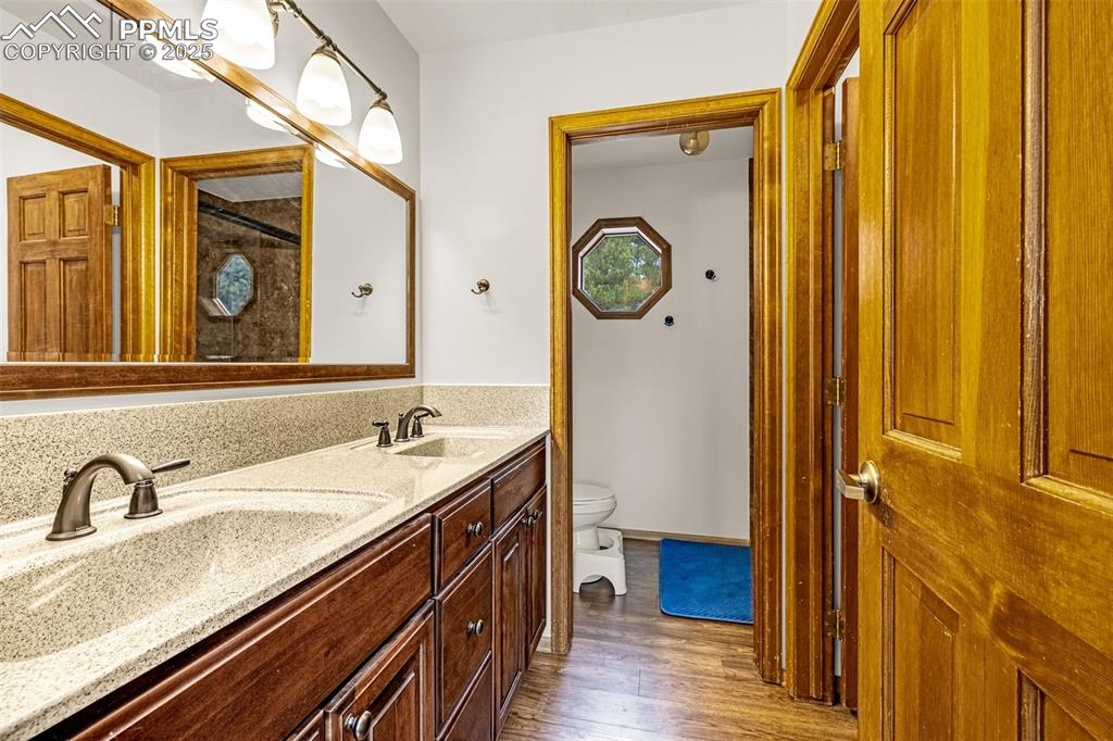 Image 25 of 37: UPSTAIRS HALLWAY BATHROOM