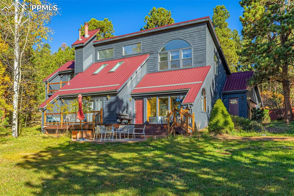 Image 41 of 47: Woodland Park oasis with mountain views