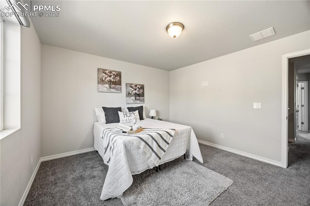 Image 16 of 38: Bedroom