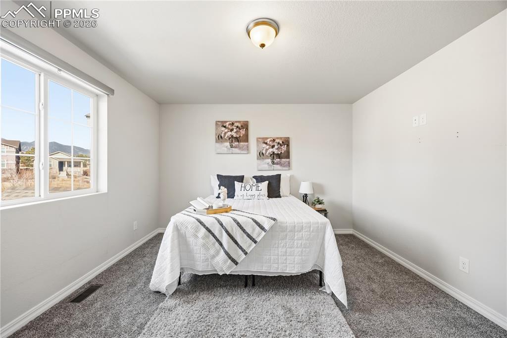 Image 17 of 38: Bedroom