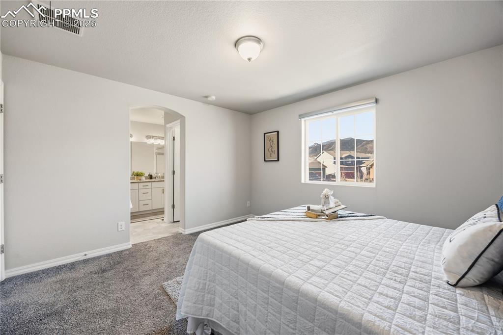 Image 20 of 38: Bedroom