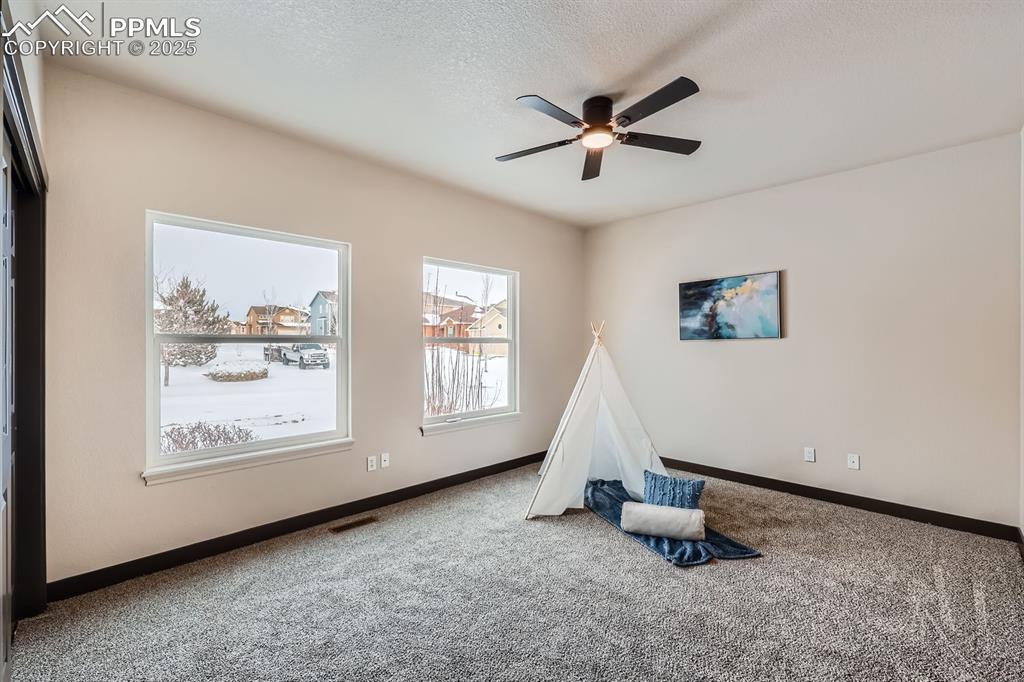 Image 15 of 25: Upstairs bedroom