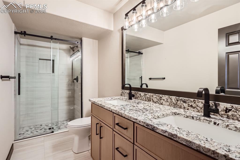 Image 18 of 25: Basement Bathroom