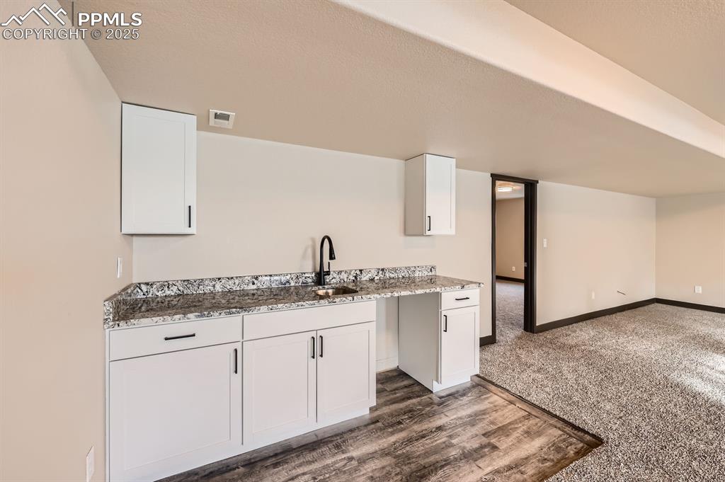 Image 21 of 25: Wet Bar in the basement