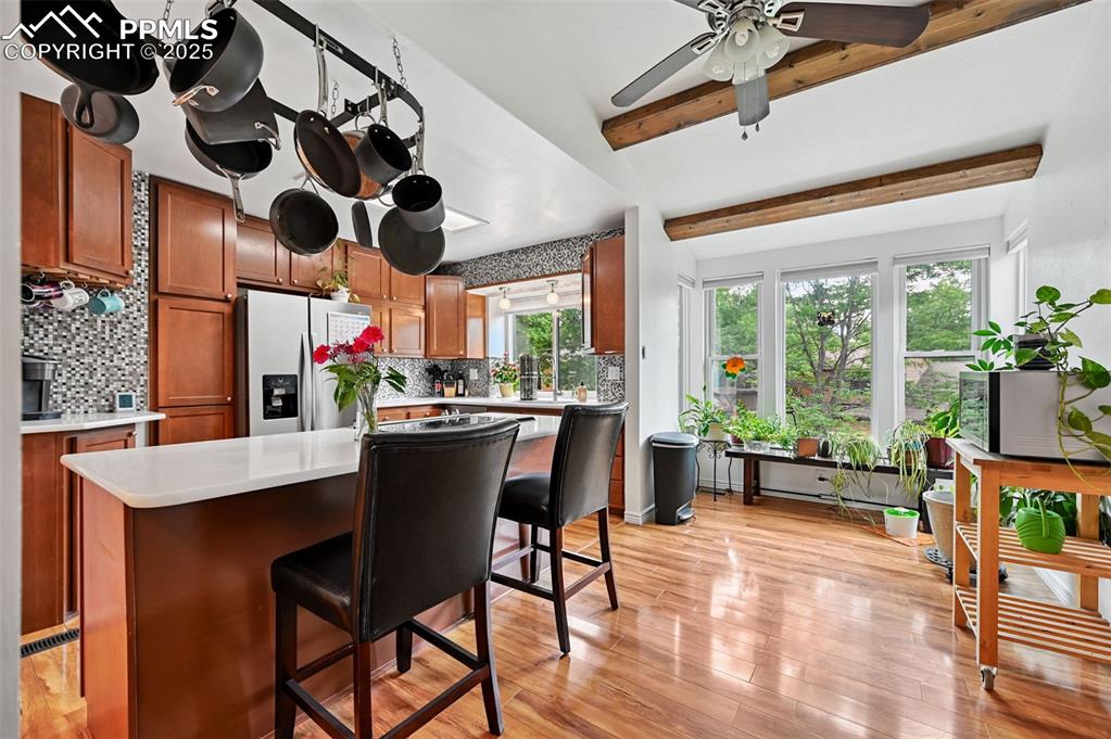 Image 5 of 42: Beautiful, open kitchen with lots of cabinets.