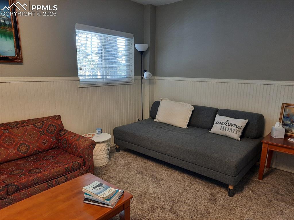 Image 24 of 34: Basement apartment living room