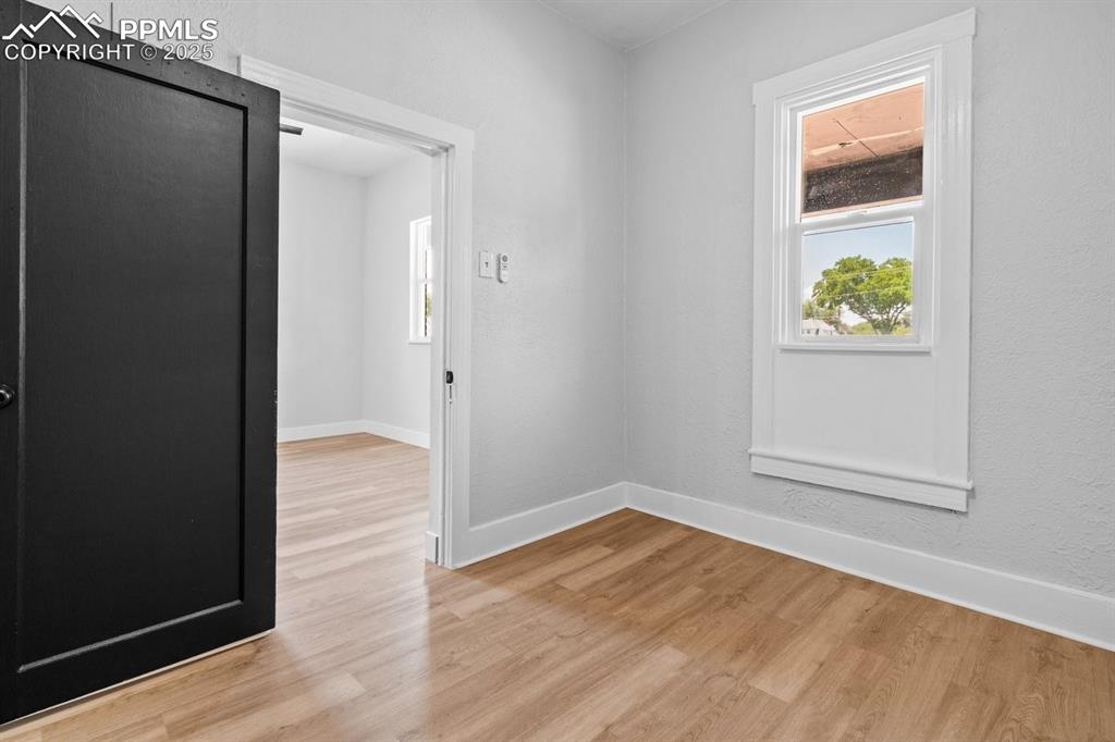 Image 5 of 41: Unfurnished room featuring light hardwood / wood-style floors