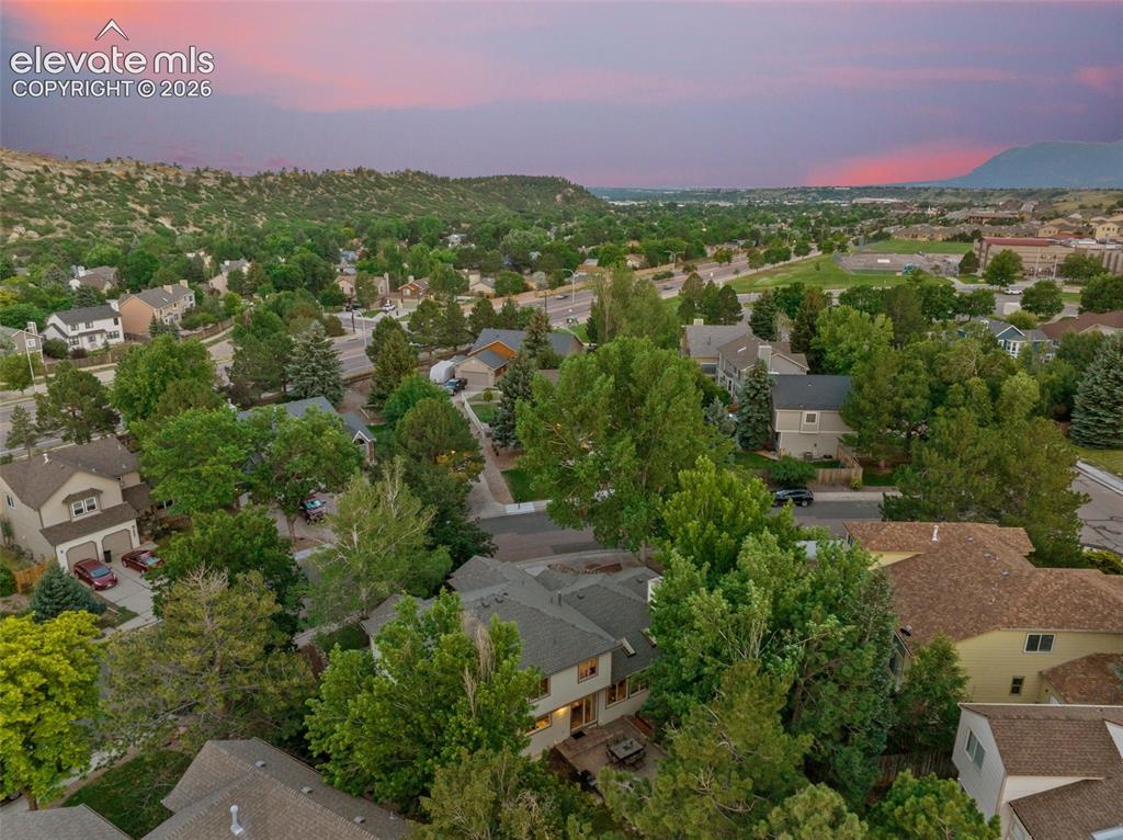 Image 48 of 49: Aerial perspective showcasing a residential area with varied home designs a