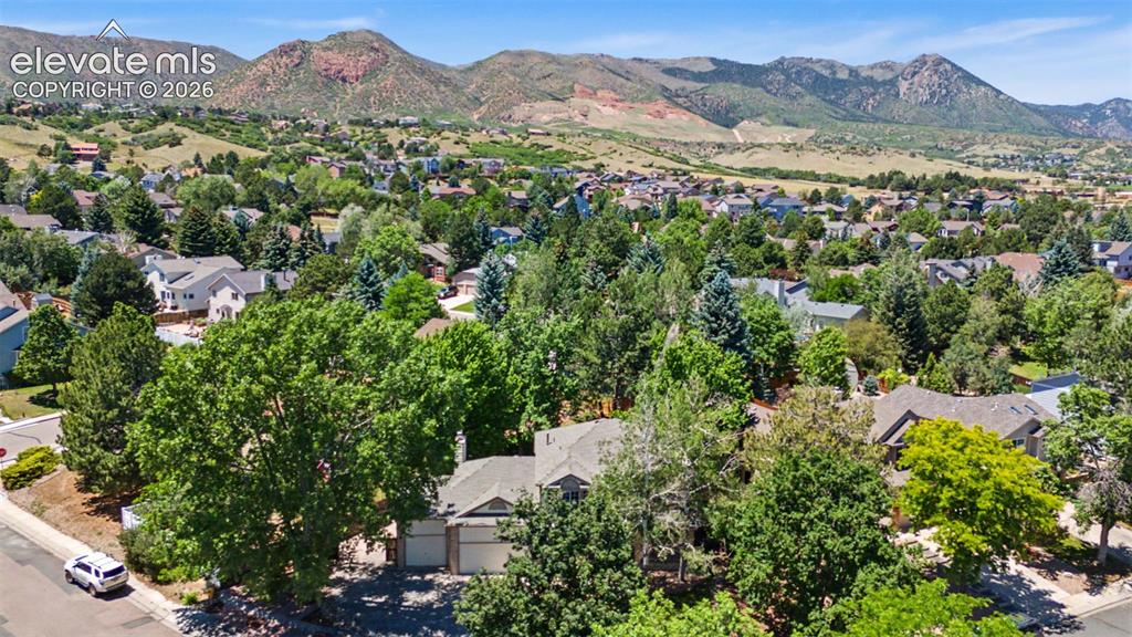 Image 5 of 49: Aerial perspective showcasing a residential neighborhood with varied archit