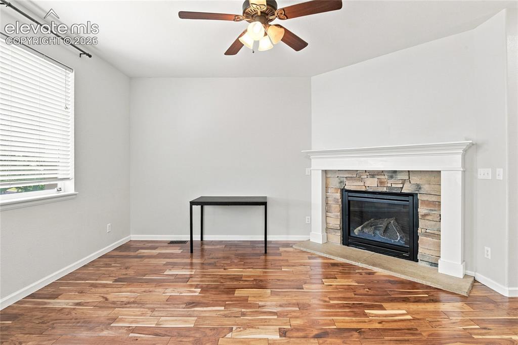 Image 4 of 18: Hardwood-style flooring throughout
