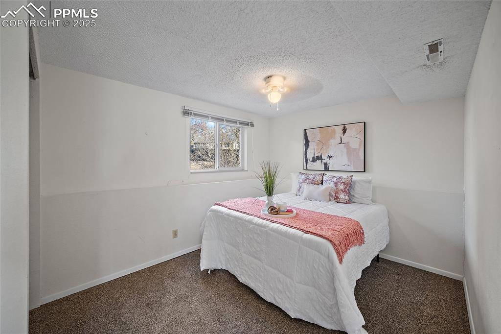 Image 23 of 49: Primary bedroom #3 downstairs