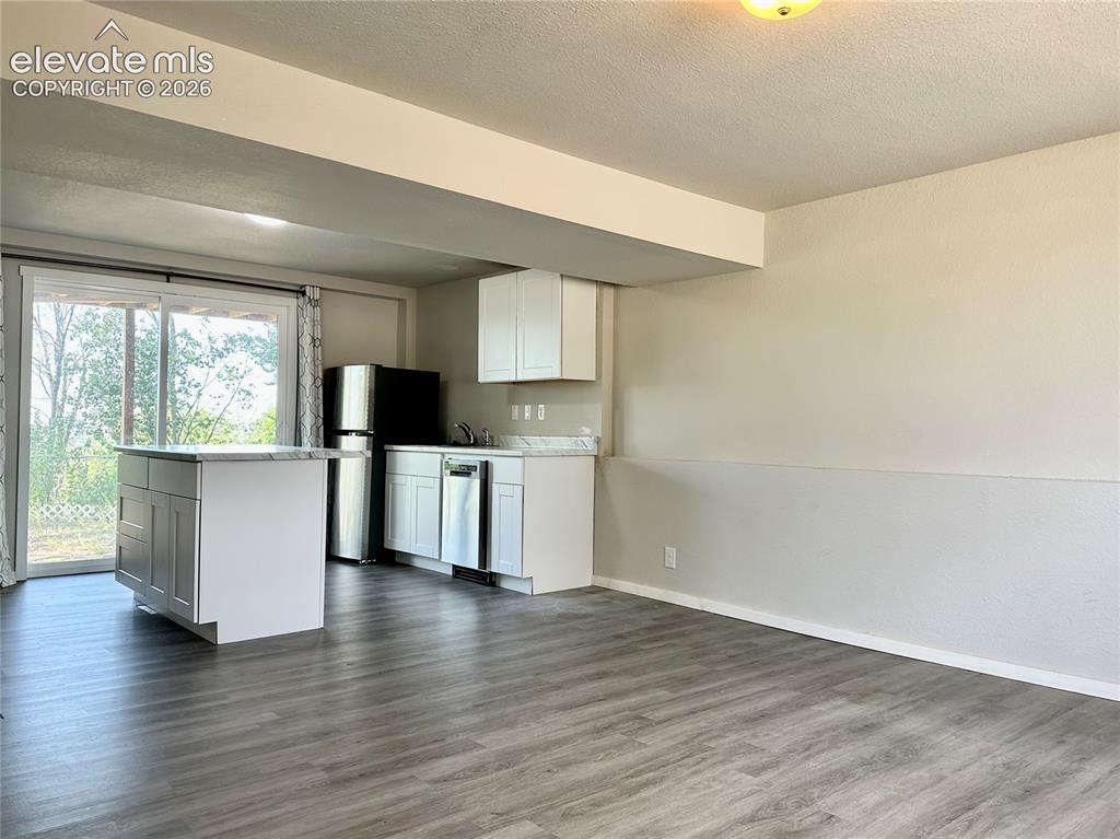 Image 20 of 35: Unit B- Kitchen/Dining Room