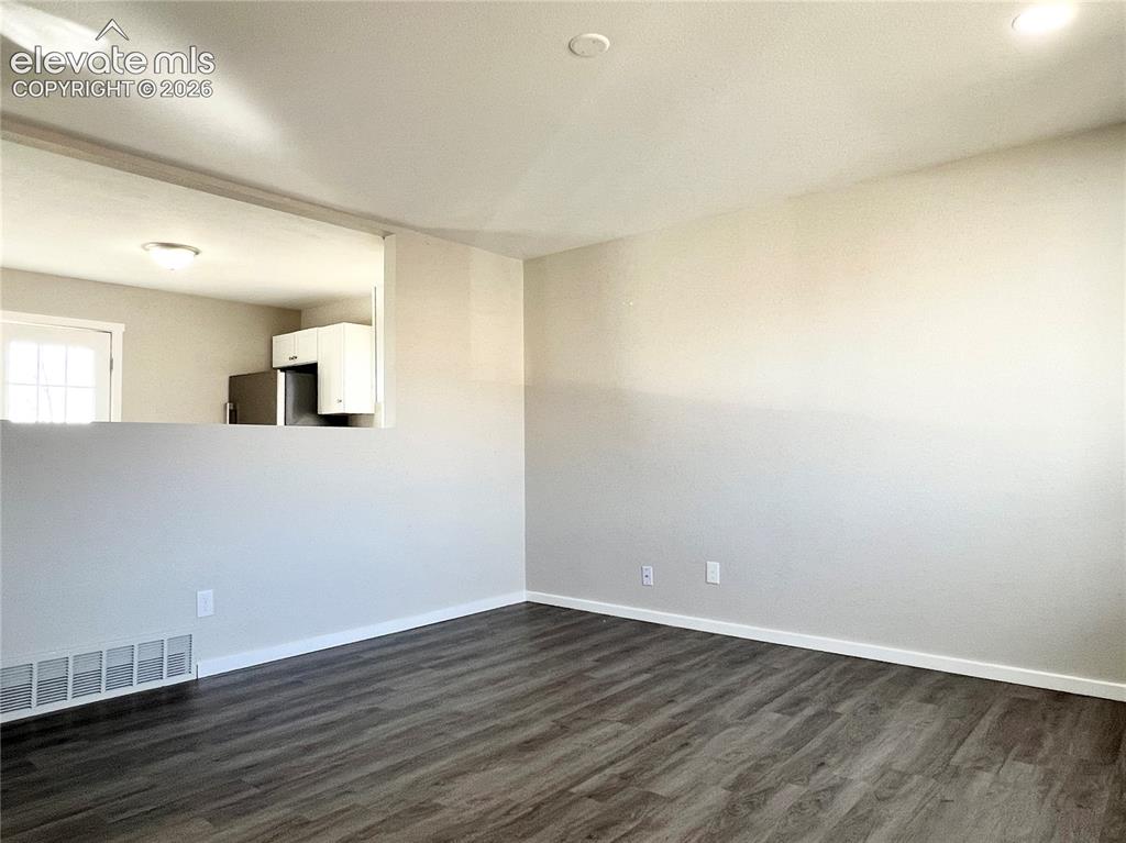 Image 7 of 35: Unit A- Living Room