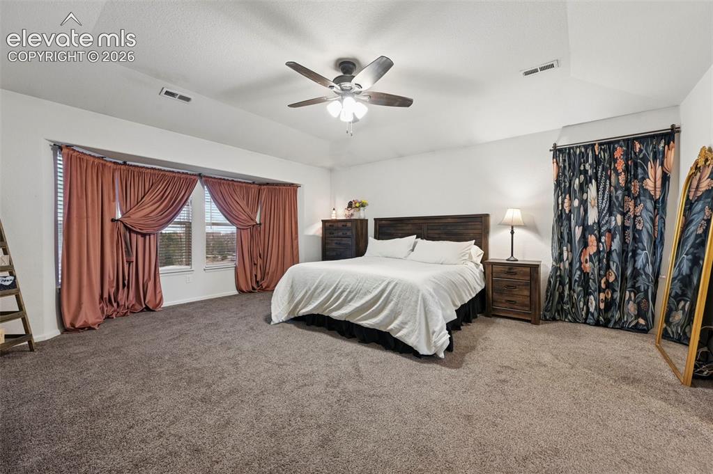 Image 21 of 39: Master Bedroom