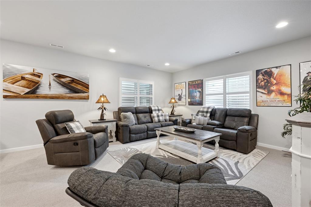 Image 30 of 44: Another view of the basement entertainment area!