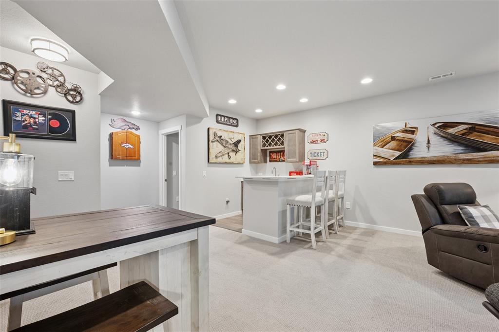 Image 31 of 44: Wet bar and dart board included!