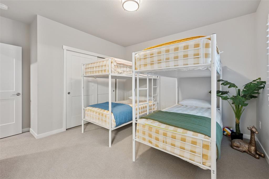 Image 36 of 44: Fourth bedroom with jack--n-jill bath!