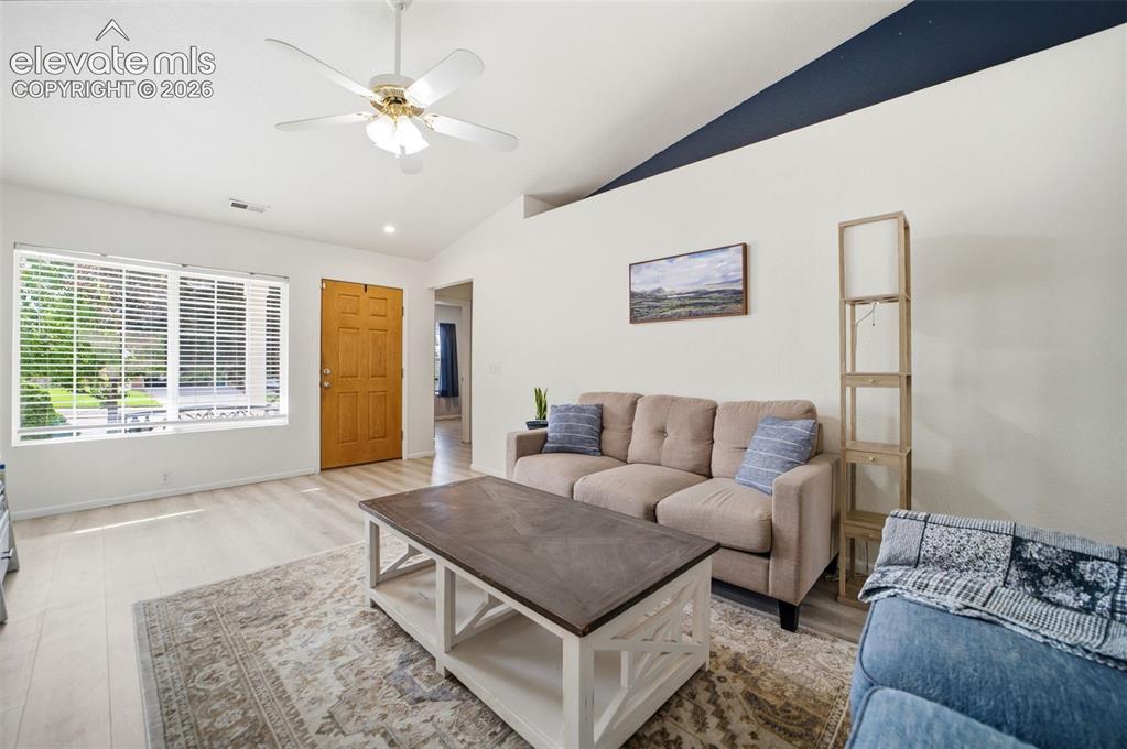 Image 5 of 38: Vaulted ceilings and open floorplan