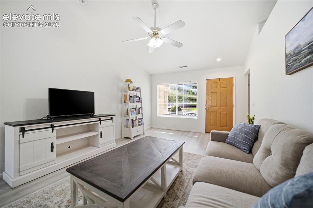 Image 6 of 38: Vaulted ceilings and open floorplan
