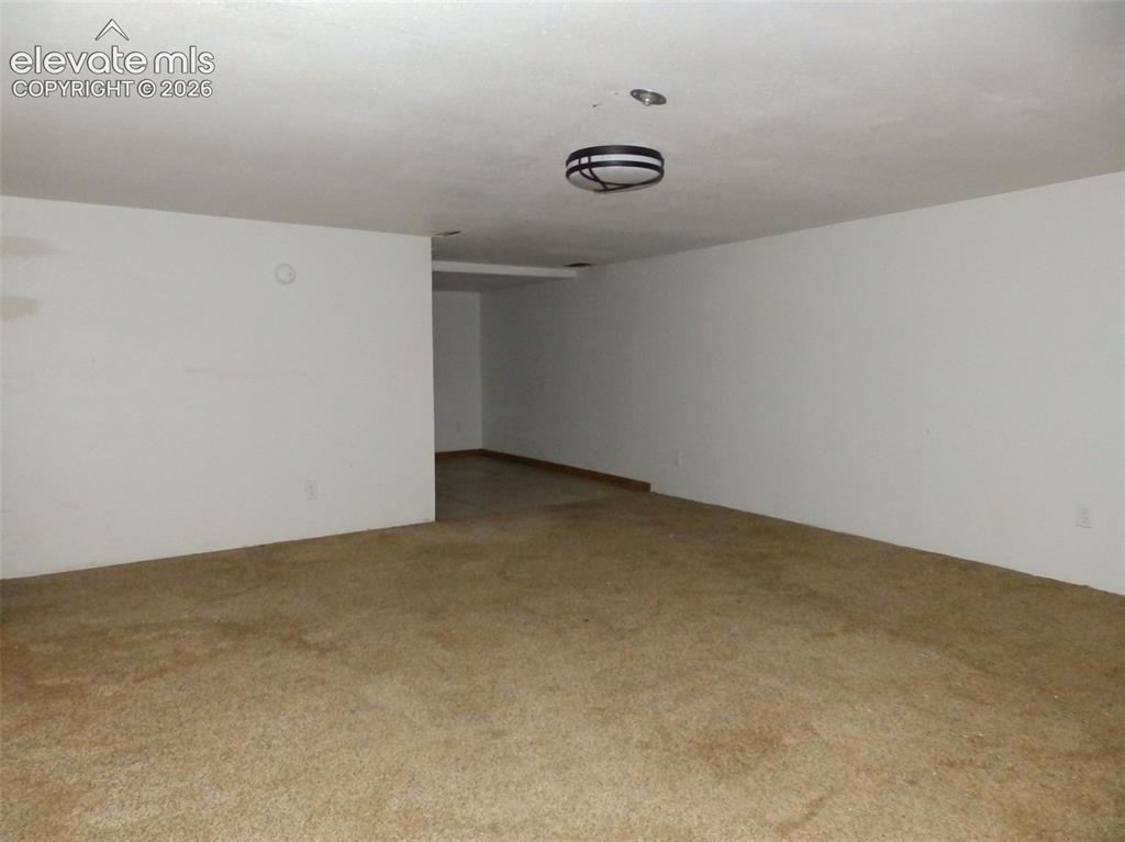 Image 19 of 19: non-conforming bedroom in basement