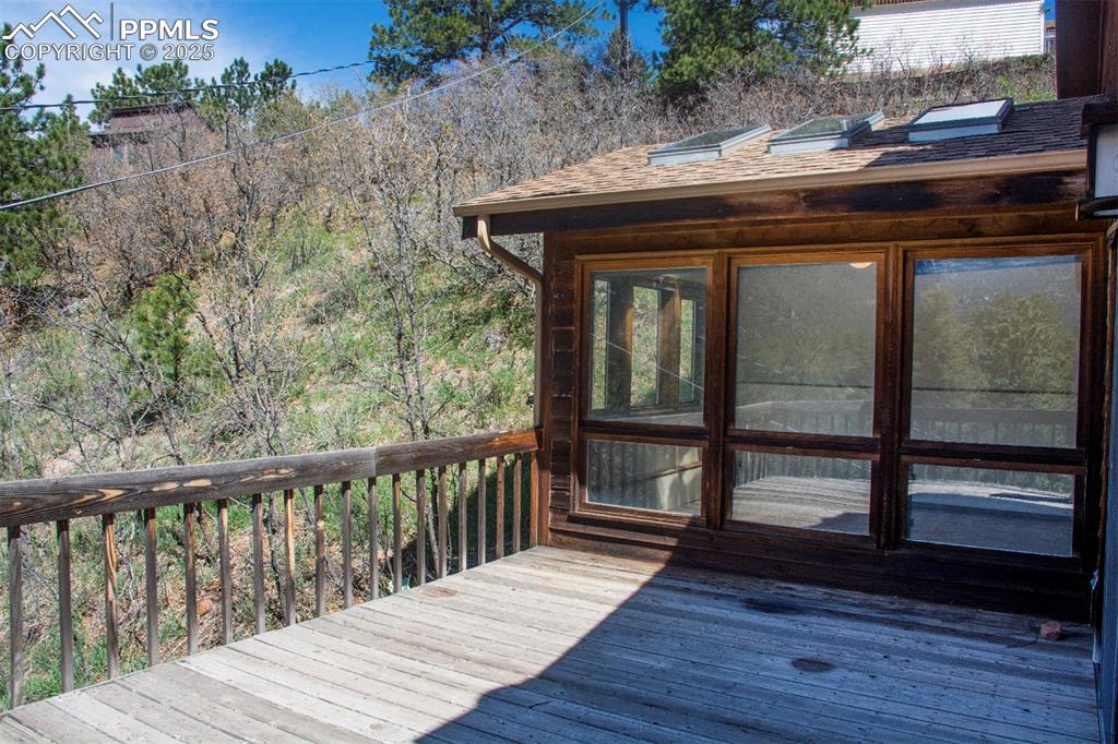 Image 39 of 46: View of the greenhouse/ Green Room off the kitchen.