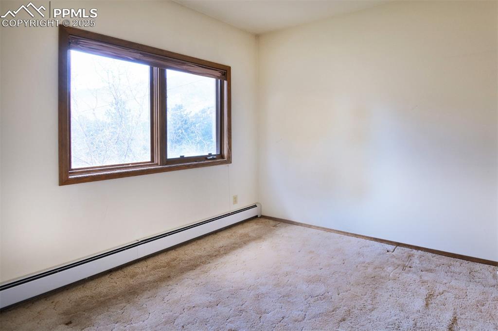 Image 9 of 46: Bedroom on the lower level.