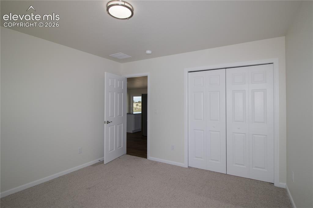 Image 14 of 28: Bedroom