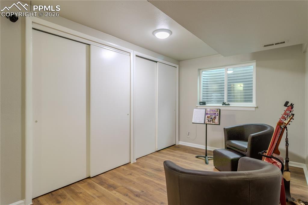 Image 24 of 29: Basement sitting/play room