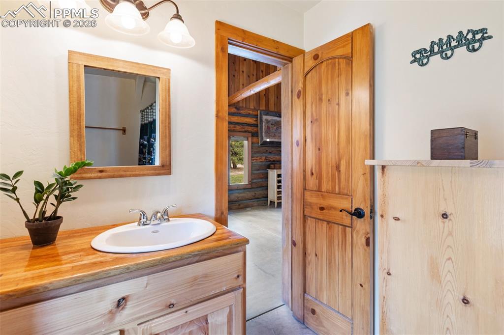 Image 30 of 48: The second bedroom features a private entry