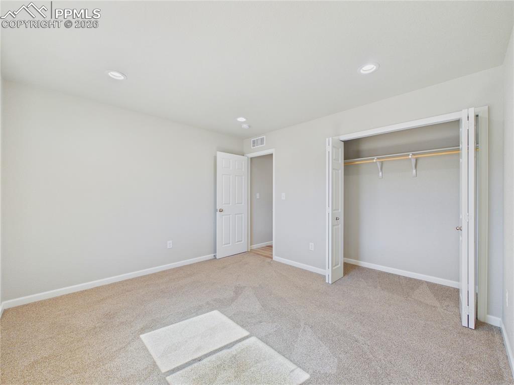 Image 21 of 31: Bedroom