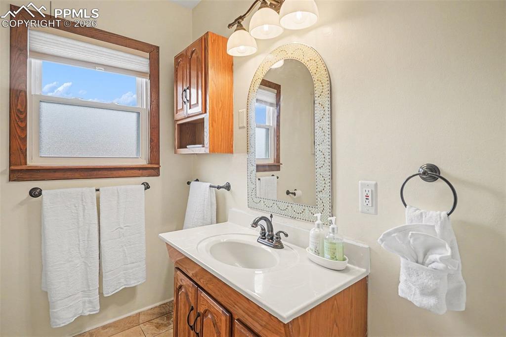 Image 11 of 25: Beautifully remodeled bathroom