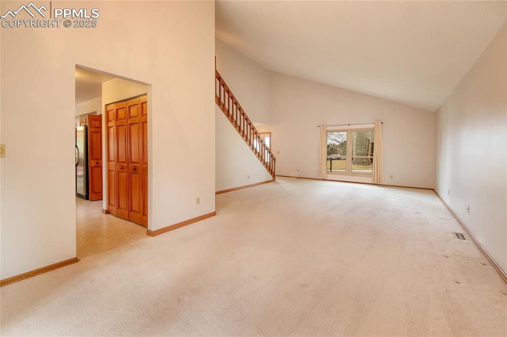 Image 7 of 48: Living and dining rooms with expansive space