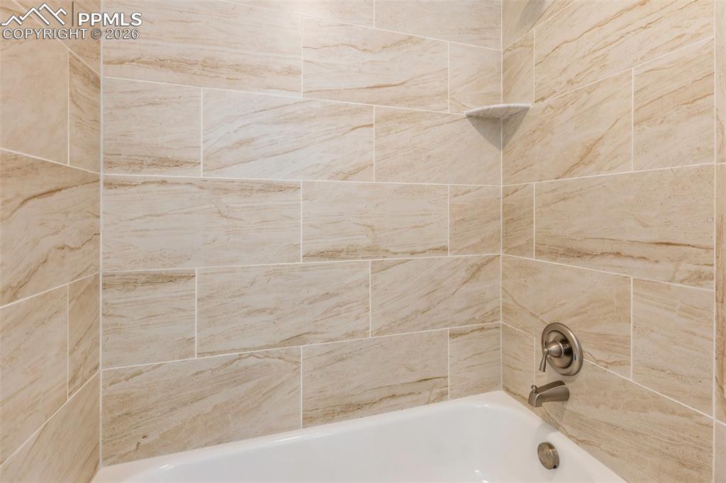 Image 30 of 44: Spa Shower Primary Bathroom