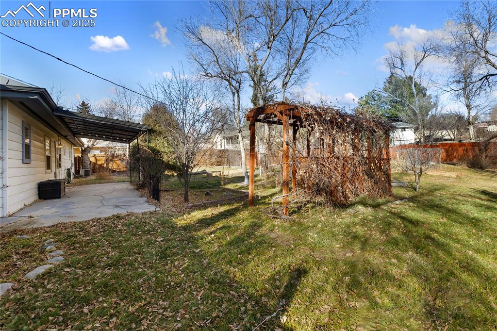 Image 6 of 44: The yard is the gem of this property - features a large, fenced lot complet