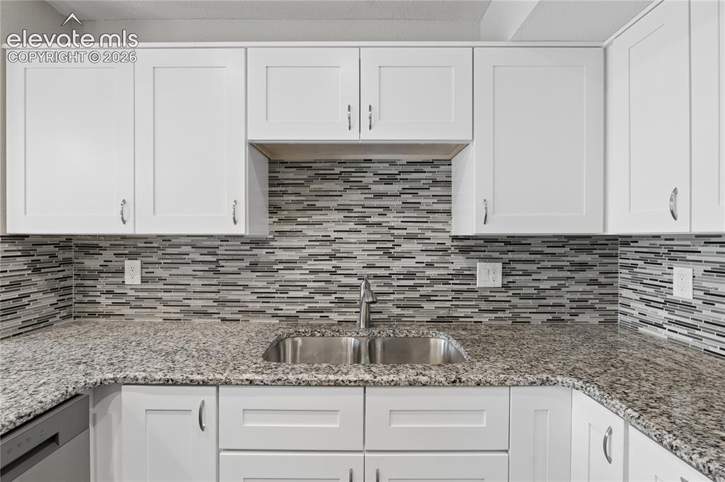 Image 11 of 25: Remodeled Kitchen with new cabinets, granite counters 
