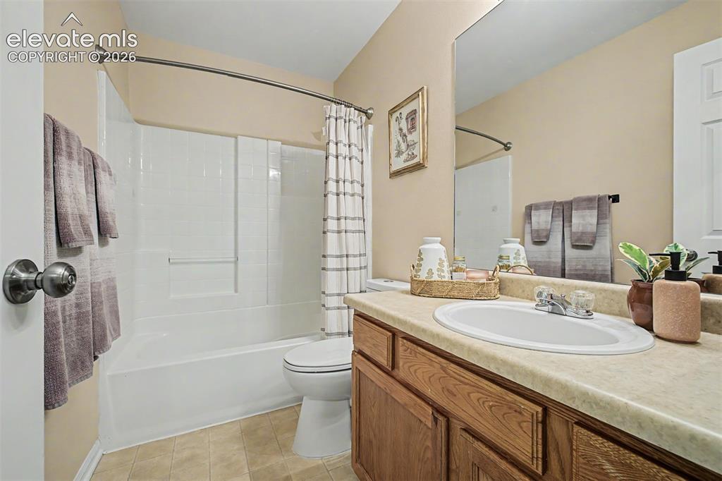 Image 34 of 45: Versatile room with neutral wall tones and carpeted flooring is perfect fo