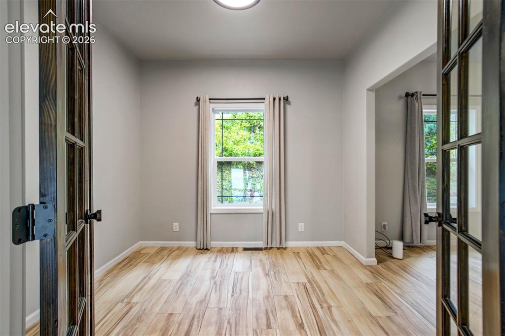 Image 14 of 48: office attached to primary suite