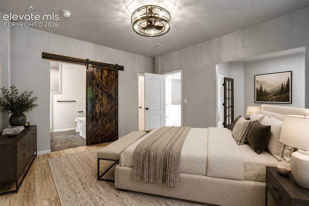 Image 15 of 48: Primary suite with 5 piece ensuite bath walk-in closet
